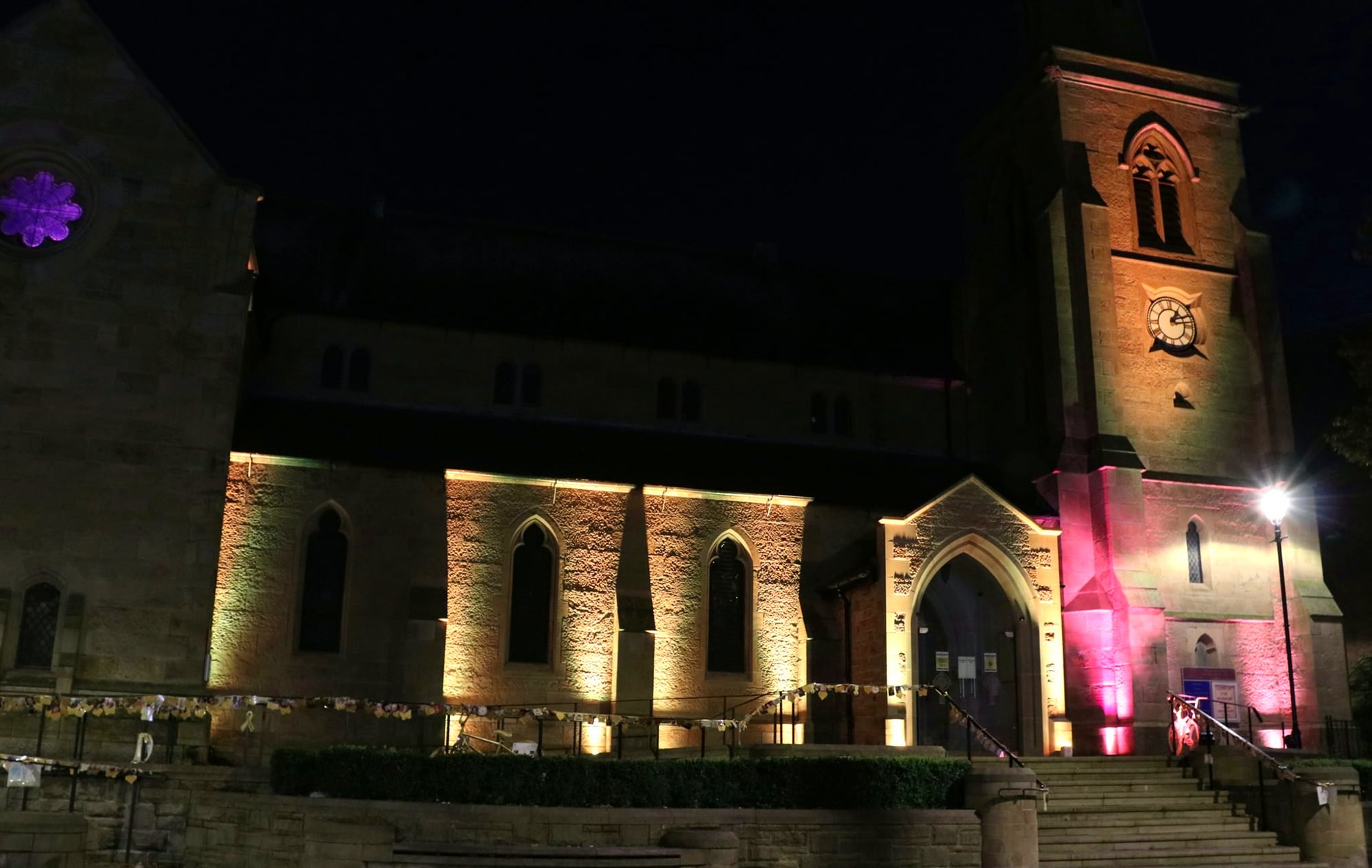 St Mary’s Church in Flint lit up gold at night